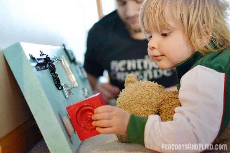 Toddler approved DIY busy latch board tutorial to keep your energetic child entertained.