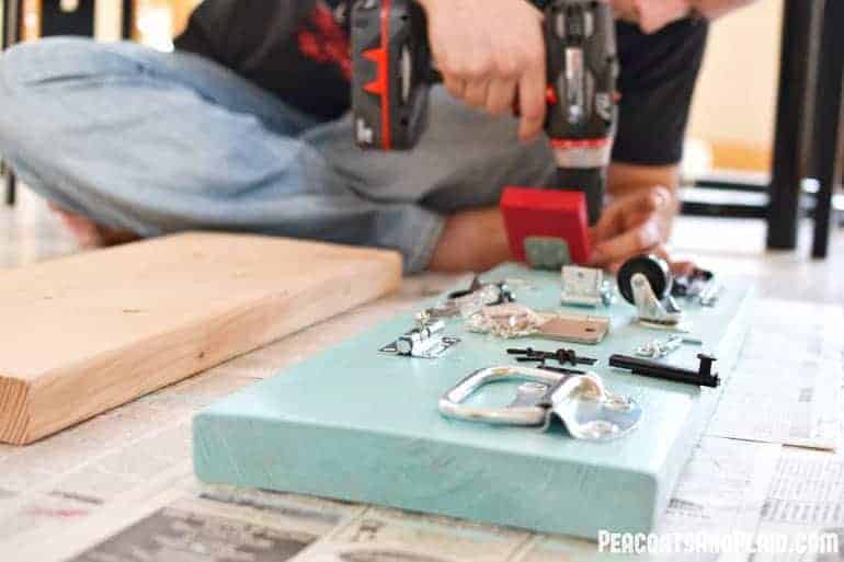 Toddler approved DIY busy latch board tutorial to keep your energetic child entertained.