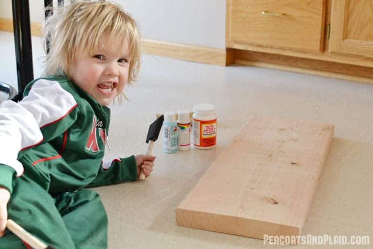 Toddler approved DIY busy latch board tutorial to keep your energetic child entertained.