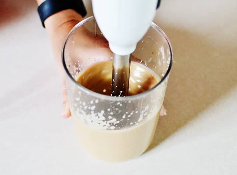 This copycat coffee recipe for an Iced Salted Caramel Mocha is easy and super delicious! The best iced coffee I've ever had.