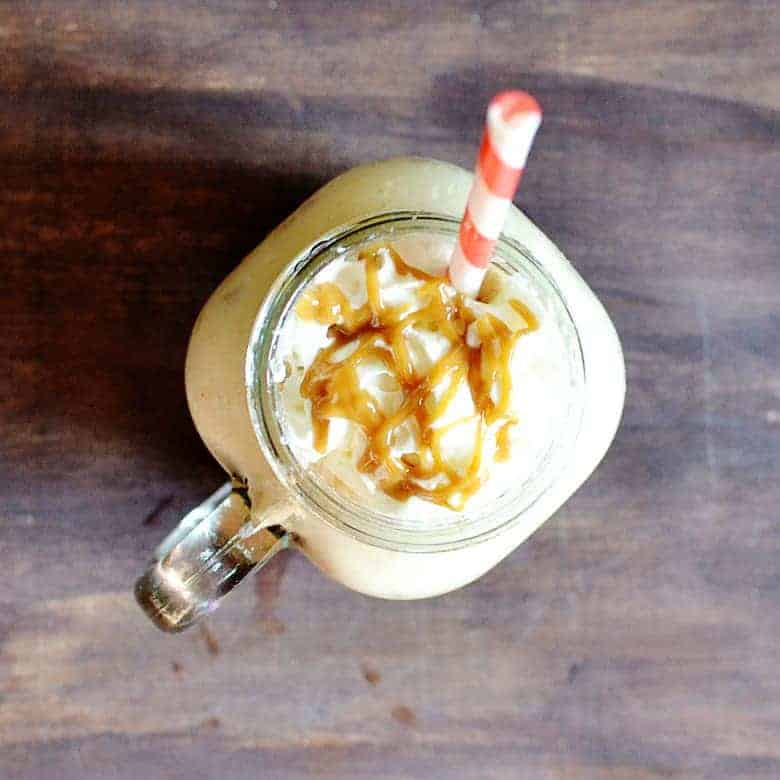 This copycat coffee recipe for an Iced Salted Caramel Mocha is easy and super delicious! The best iced coffee I've ever had.