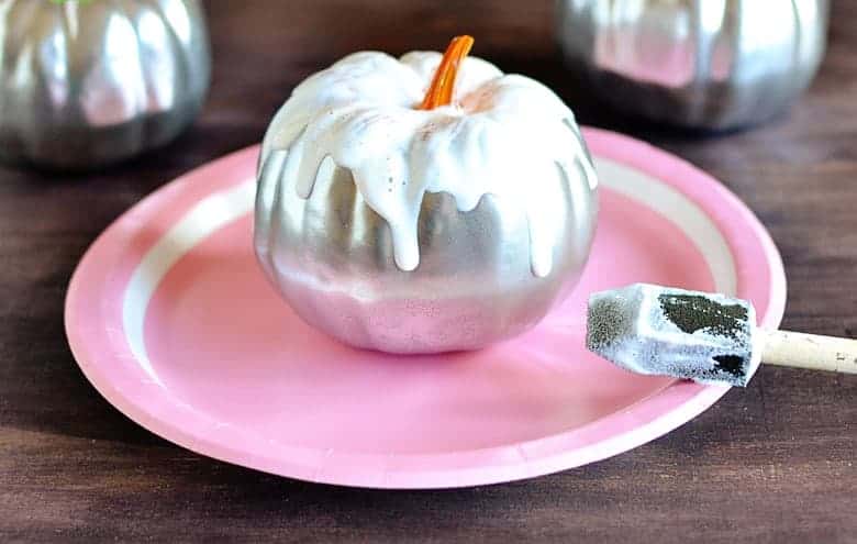 This is the perfect budget Halloween decor project. Love these cute glitter frosted mini pumpkins!