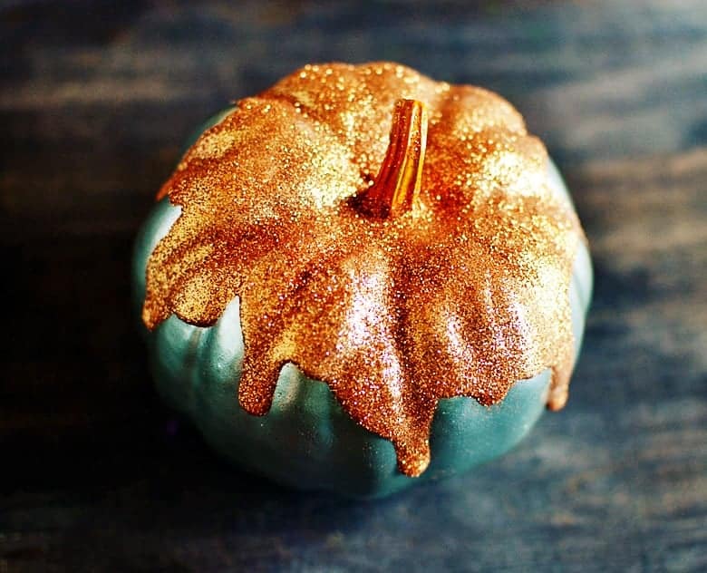 This is the perfect budget Halloween decor project. Love these cute glitter frosted mini pumpkins!