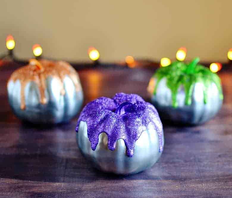 This is the perfect budget Halloween decor project. Love these cute glitter frosted mini pumpkins!