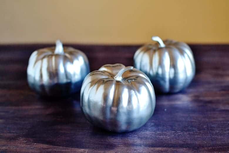 This is the perfect budget Halloween decor project. Love these cute glitter frosted mini pumpkins!