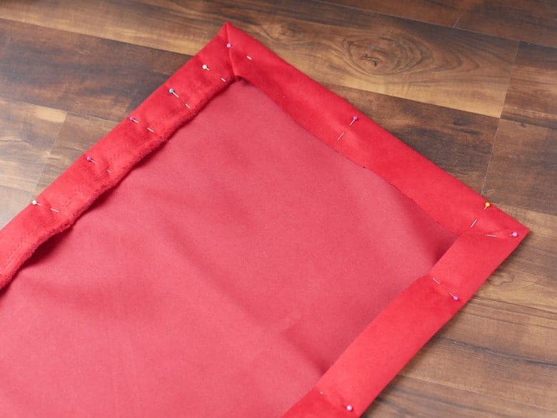 This Knock Off DIY Pottery Barn Velvet Table Runner can be made for under $20!