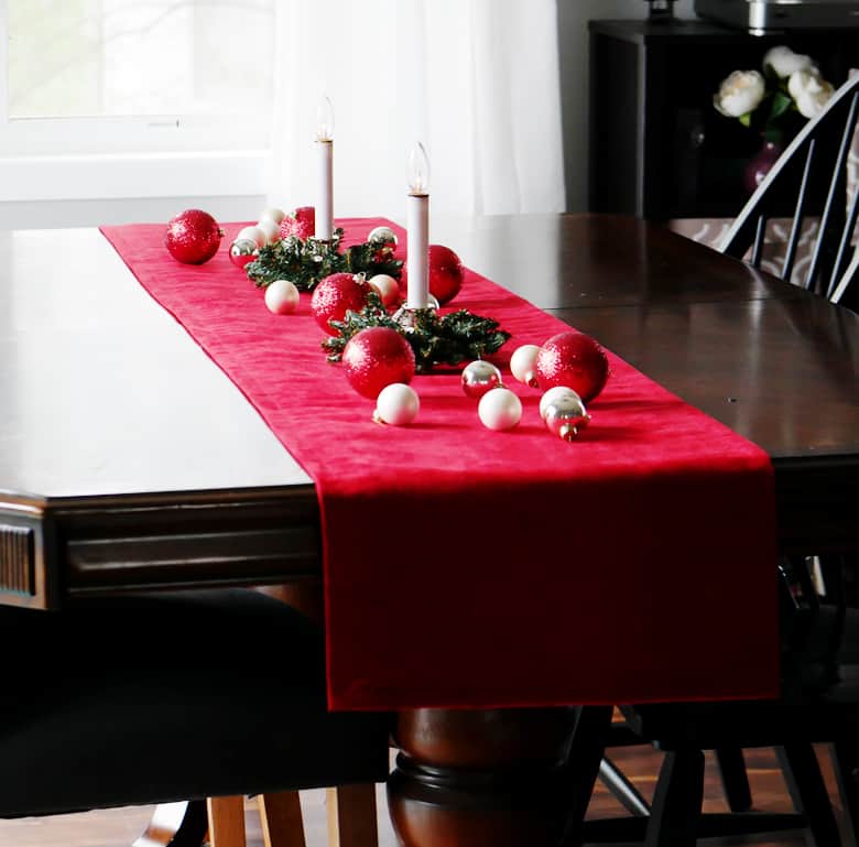 This Knock Off DIY Pottery Barn Velvet Table Runner can be made for under $20!