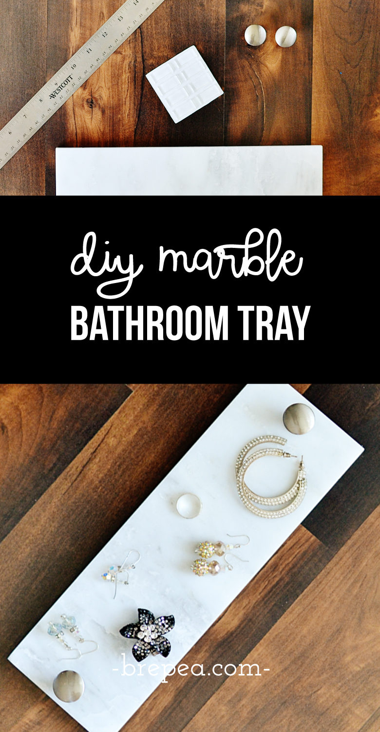 This easy DIY marble toilet tank tray is the perfect solution for toilet tank decor and organization for a small bathroom.