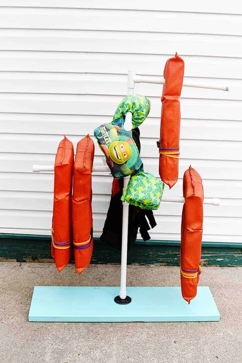 This is such a great life jacket organization idea! This DIY life jacket rack is perfect for drying and organizing!