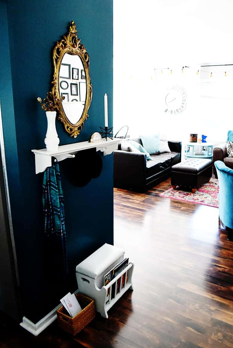 Get inspiration for your entryway with these DIY thrift store entryway decor ideas and check out this peacock blue entryway makeover!