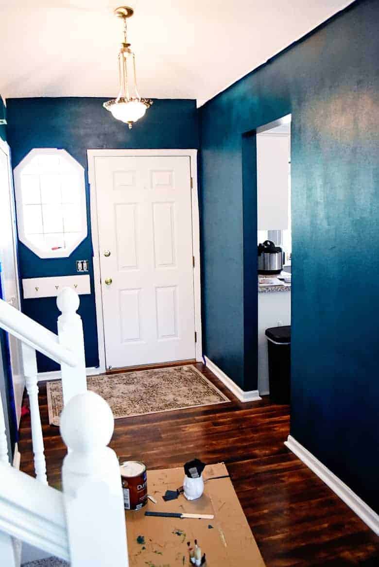 Get inspiration for your entryway with these DIY thrift store entryway decor ideas and check out this peacock blue entryway makeover!