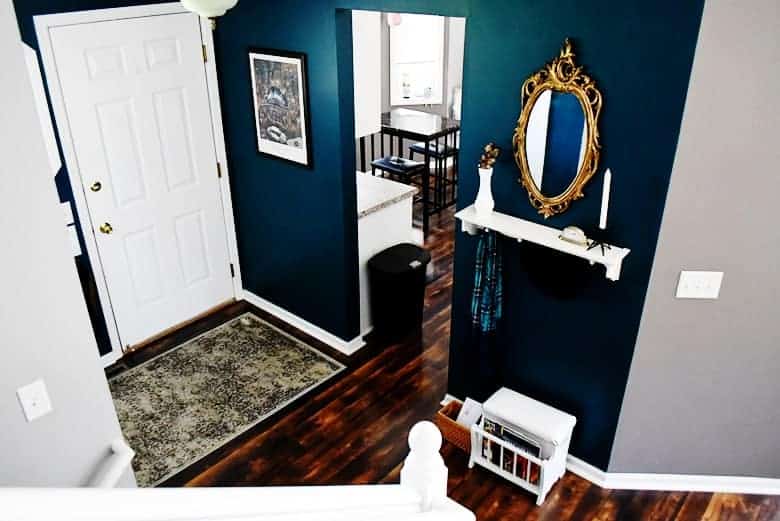 Get inspiration for your entryway with these DIY thrift store entryway decor ideas and check out this peacock blue entryway makeover!