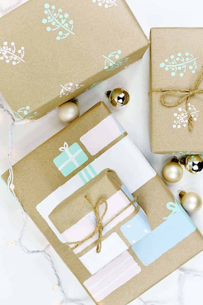 Make this durable and cute, easy DIY wrapping paper that's perfect for Christmas! All you need is a roll of brown kraft paper and some stencils.