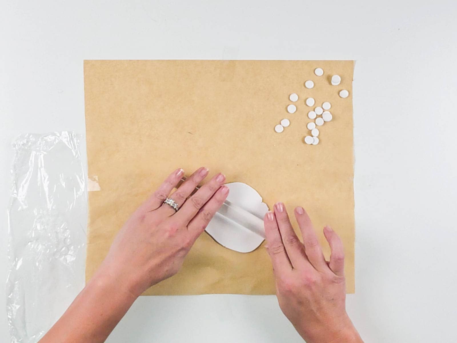 Sculpey polymer clay rolled to an even thickness on parchment paper